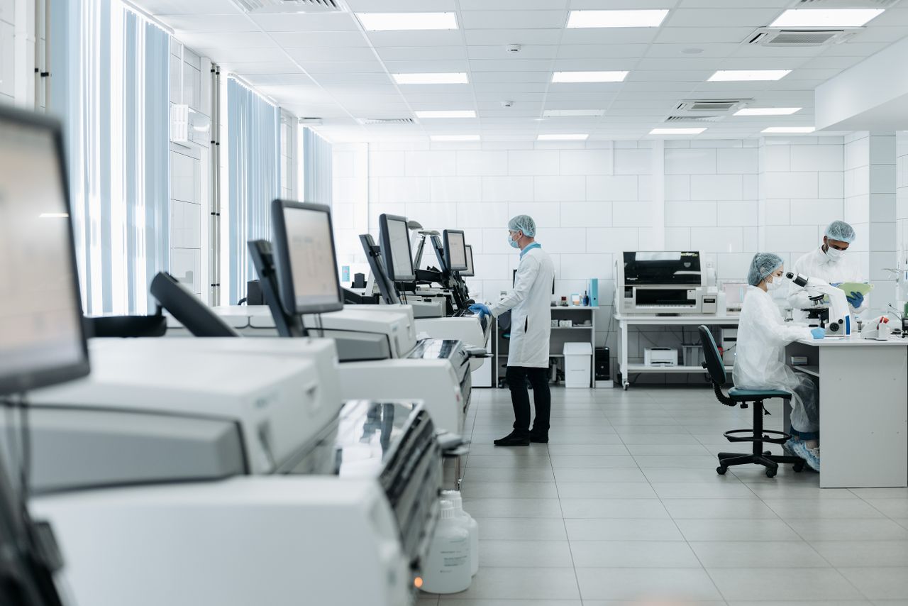 creative-03 Scientists conducting research in a state-of-the-art laboratory with advanced equipment.